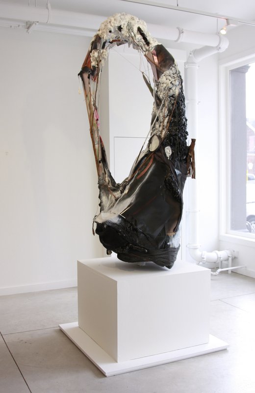 Grandfather Wreath (alternate), 2010, 100 × 36 × 36 in, wood, sawdust, paper, canvas, fabric clothing, casio watch, sequins, wire, steel, caulk, plastic, thread, yarn, beads, glue, acrylic paint, spray paint, foam insulation, and other found objects